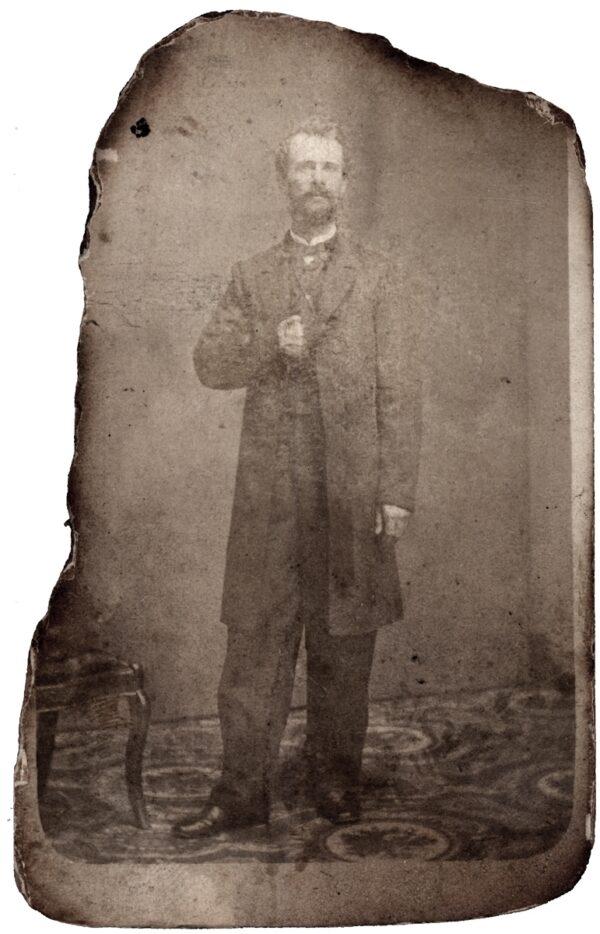 Old and frayed photograph of young Joseph Napier.