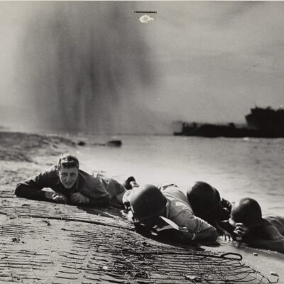 Photo: Personnel hugging the beach.