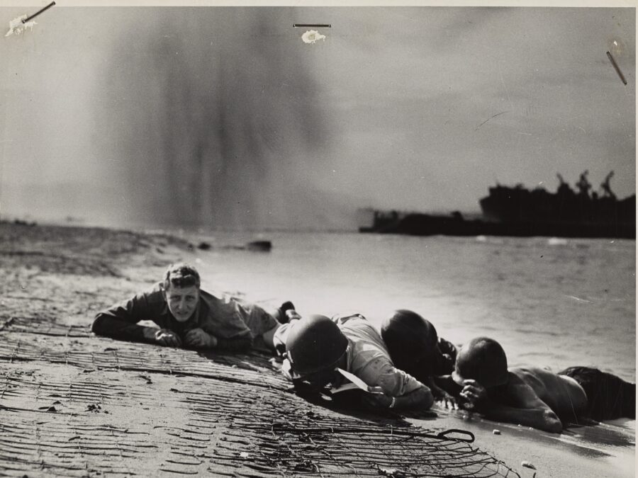 Photo: Personnel hugging the beach.