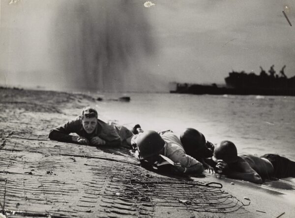 Photo: Personnel hugging the beach.