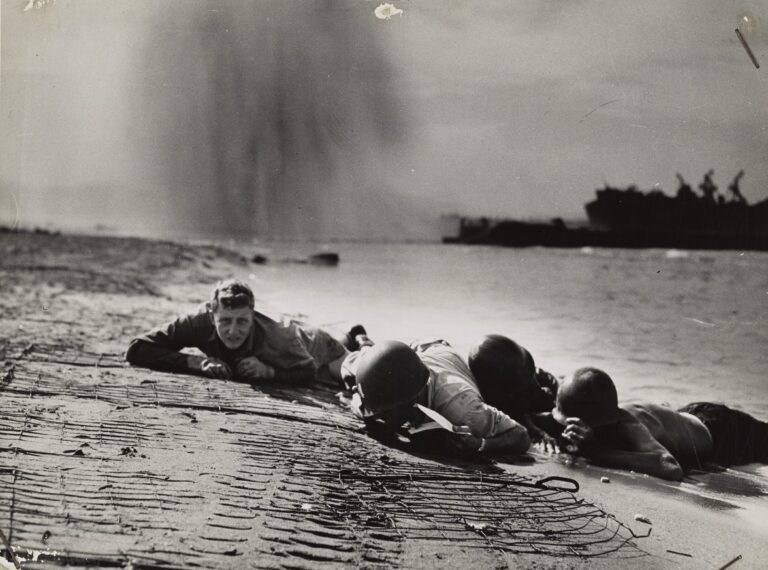Photo: Personnel hugging the beach.