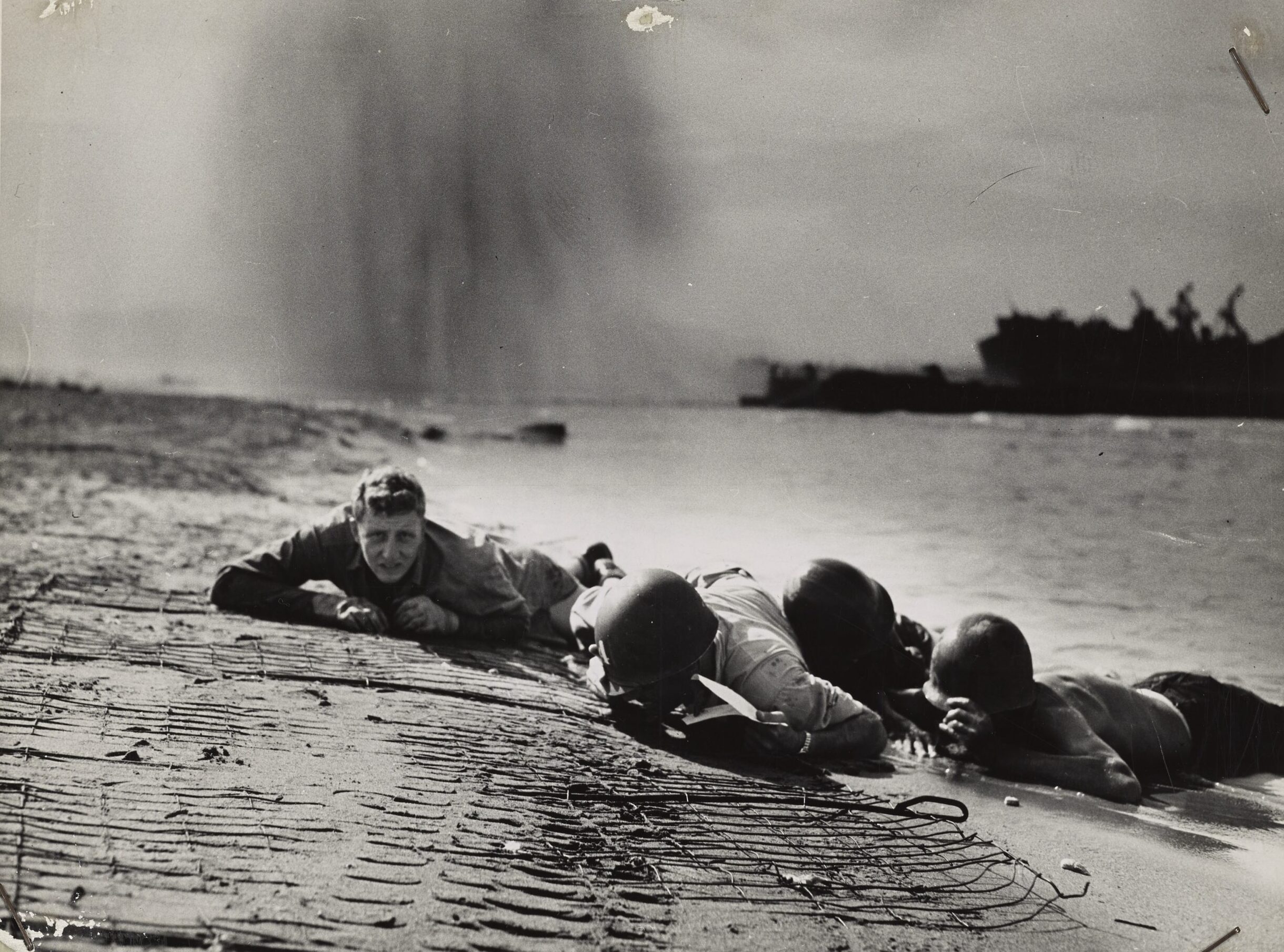 Photo: Personnel hugging the beach.
