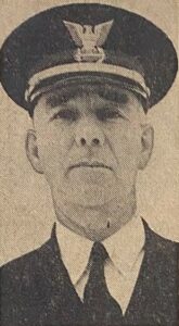 A newspaper headshot of LT Altson J. Wilson in dress uniform.