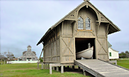 Photo: Chicamacomico Life-Saving Station, showing the boathouse, crew’s quarters and Motor Lifeboat #1046.