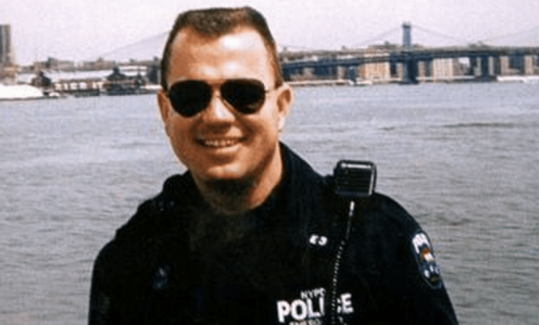 Candid photo of Vincent G. Danz in his NYPD uniform at the waterfront.