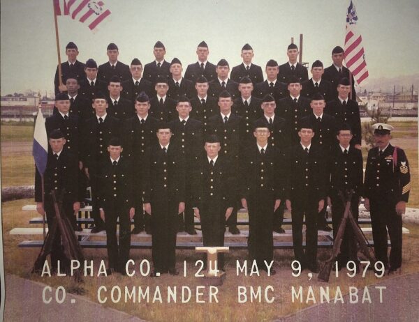 Photo: Graduation picture showing 5 rows of uniformed men with colors.