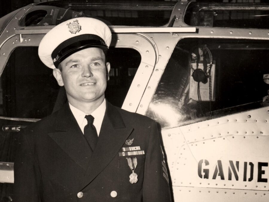 Photo: Gus Jablonski shows off his decoration while posing next to the Gander Express.