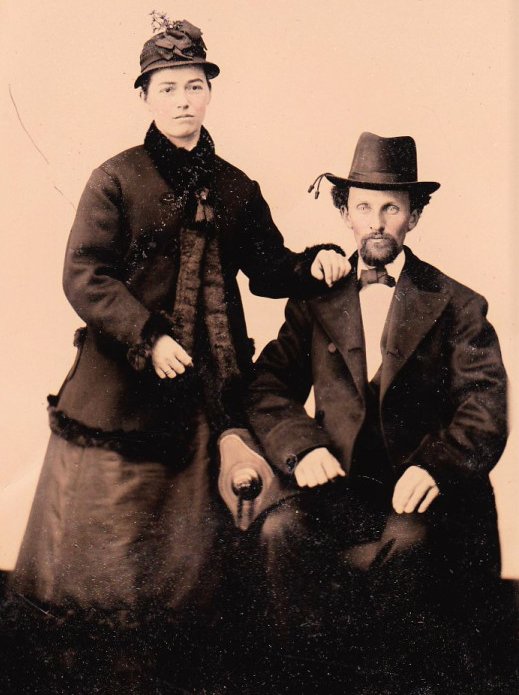 A vintage posed photograph of a young Isaac Mayo (seated) and his wife Esther Small Mayo standing behind me on his right.