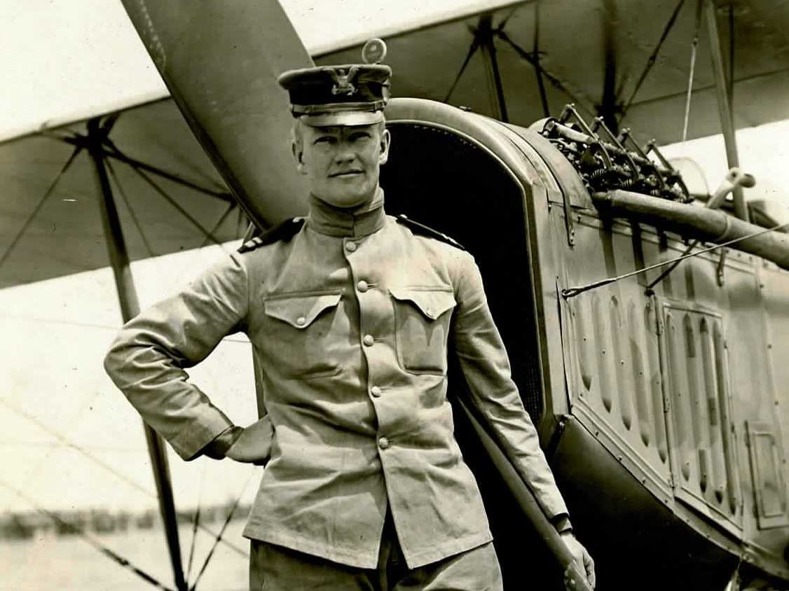 Photo: Eaton poses on the float of his aircraft.