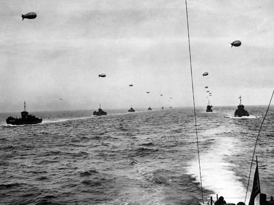 Photo: USCG LCIs with flying barrage balloons.