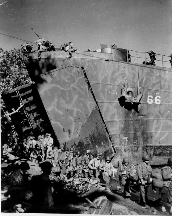 Photo: Close-up of LST-66’s bow and camouflage paint scheme.