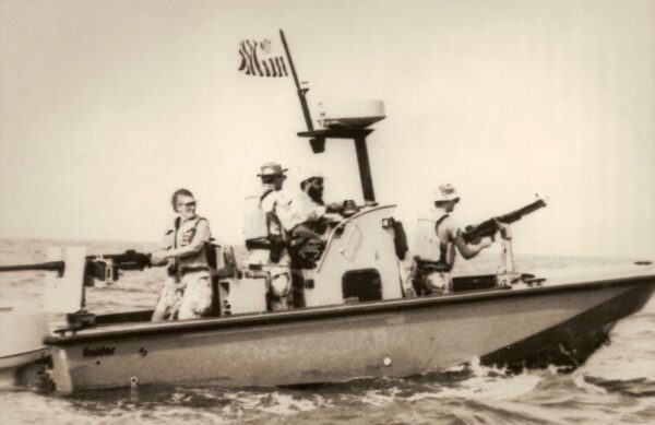 Photo: A Raider Boat with crew manning the guns.