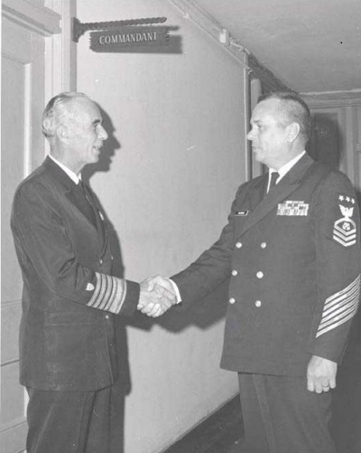 Photo: MCPOCG Calhoun shaking hands with the Commandant, Admiral Willard Smith