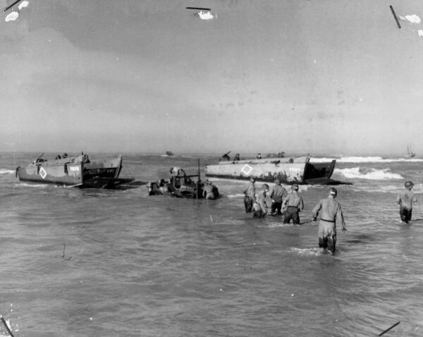 Photo: Higgins Boats landing equipment on the beaches at Sicily.