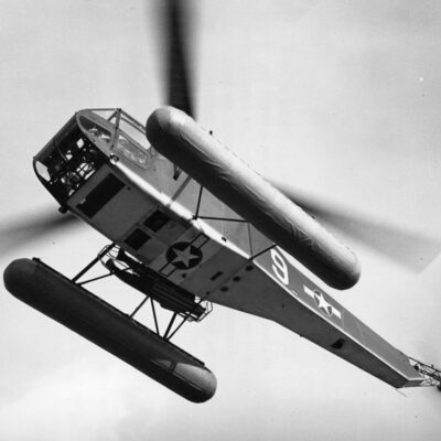 Photo: Bottom view of an HNS-1 helicopter in flight.