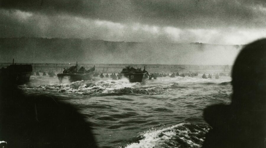 Photograph: Landing craft from the Samuel Chase landing the first wave of troops on Omaha Beach.