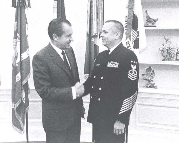 Photo: MCPOCG Calhoun shakes hands with President Nixon.