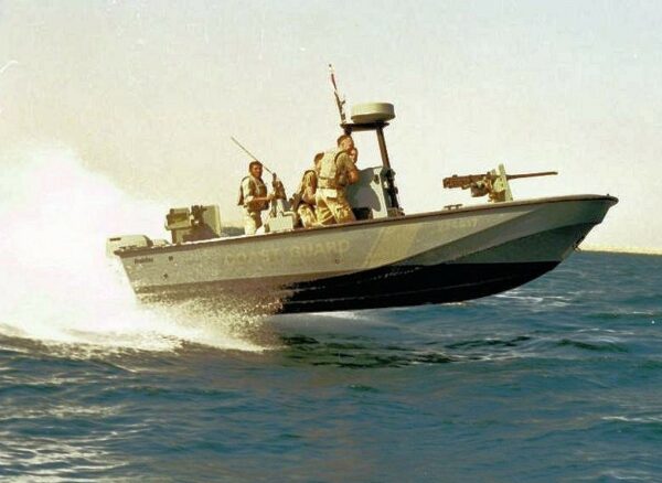 Photo: A Raider Boat in profile skips across the waves.