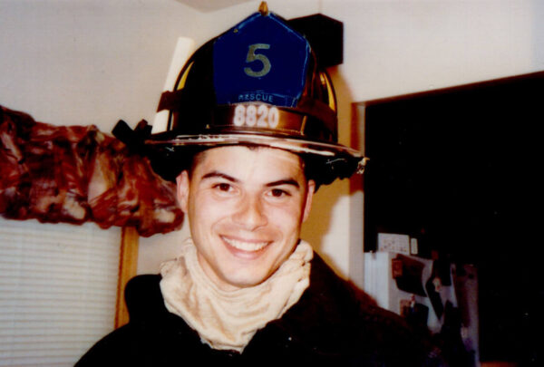 Photo: Jeffrey Palazzo posing in firefighter gear.