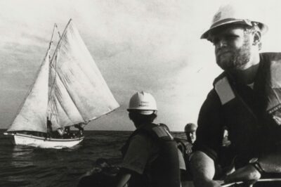 A photograph of the Chase’s boarding party motoring out to the 35-foot Haitian sailing vessel Exoribe.