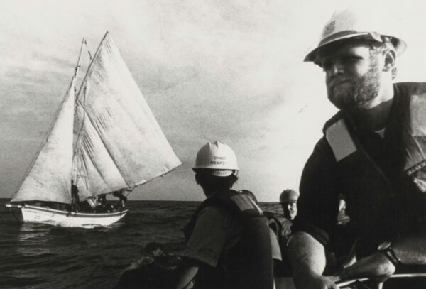 A photograph of the Chase’s boarding party motoring out to the 35-foot Haitian sailing vessel Exoribe.