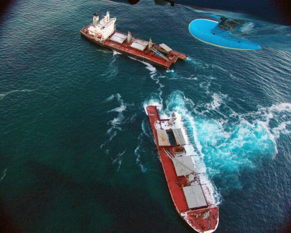 Photo: Aerial view of Selendang Ayu after it drifted aground and broke into two parts.