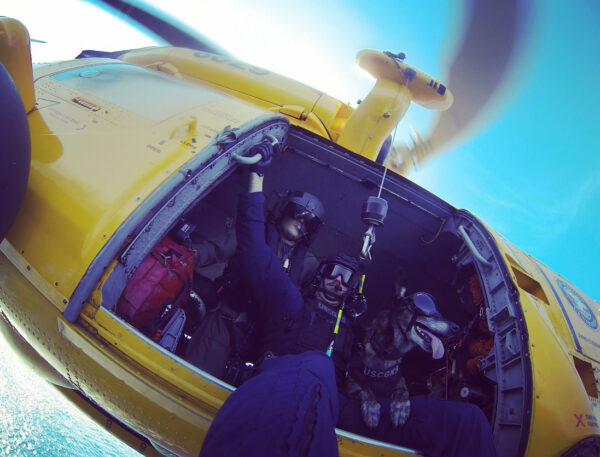 Photo: View up into a helicopter of a CEDT team.