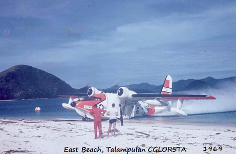 Photo: Amphibious plane lands at beach. Text on photo: East Beach, Talampulan CGLORSTA 1969