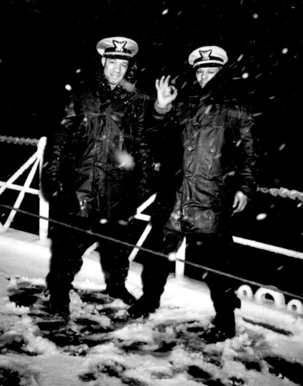 Photo of Lt. Joseph Jenkins and Lt. Clarence Samuels, pictured on deck in the snow.