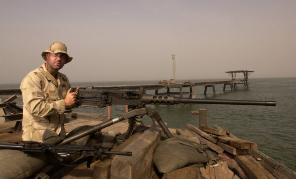 Photo: Port Security Unit member guarding an oil platform during Operation Iraqi Freedom.