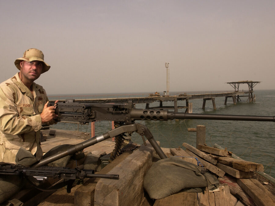 Photo: Port Security Unit member guarding an oil platform during Operation Iraqi Freedom.