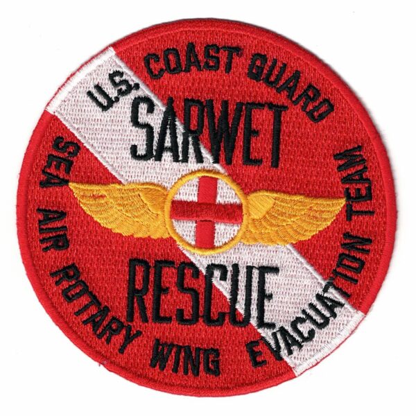 Photo: Circular embroidered patch for the first SARWET designation. Text within image says “U.S. COAST GUARD”, “SARWET”, “SEA AIR ROTARY WING EVACUATION TEAM”, and “RESCUE”.