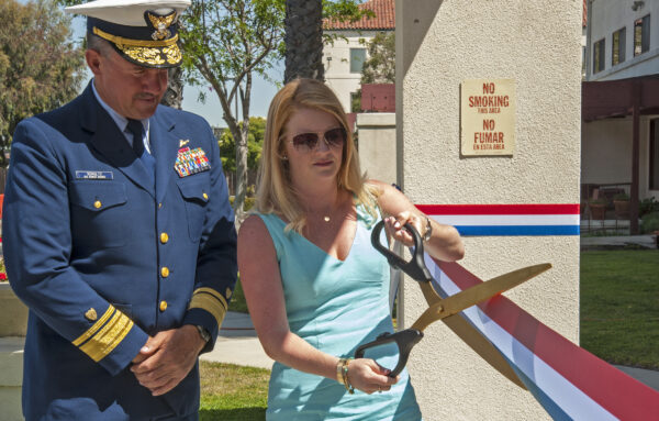 Photo: Rachel Horne cuts the ribbon to a newly dedicated building.