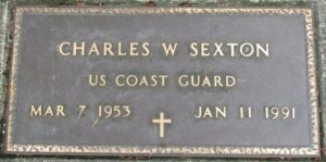 Photo: Grave marker displays the following text: Charles W Sexton, U.S. Coast Guard, March 7, 1953-January 11, 1991