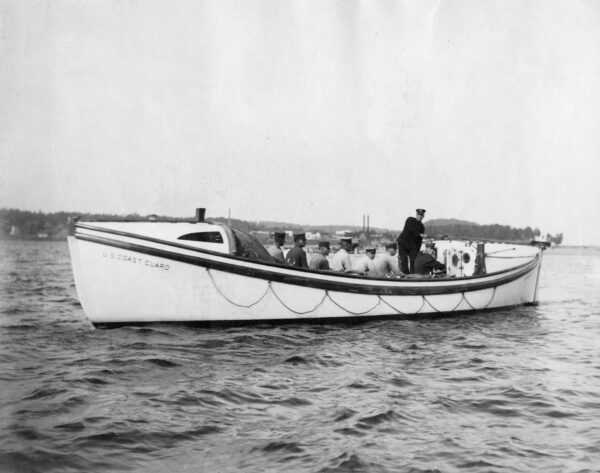 Photo: Port view of a Type “E” motor surfboat with crew.