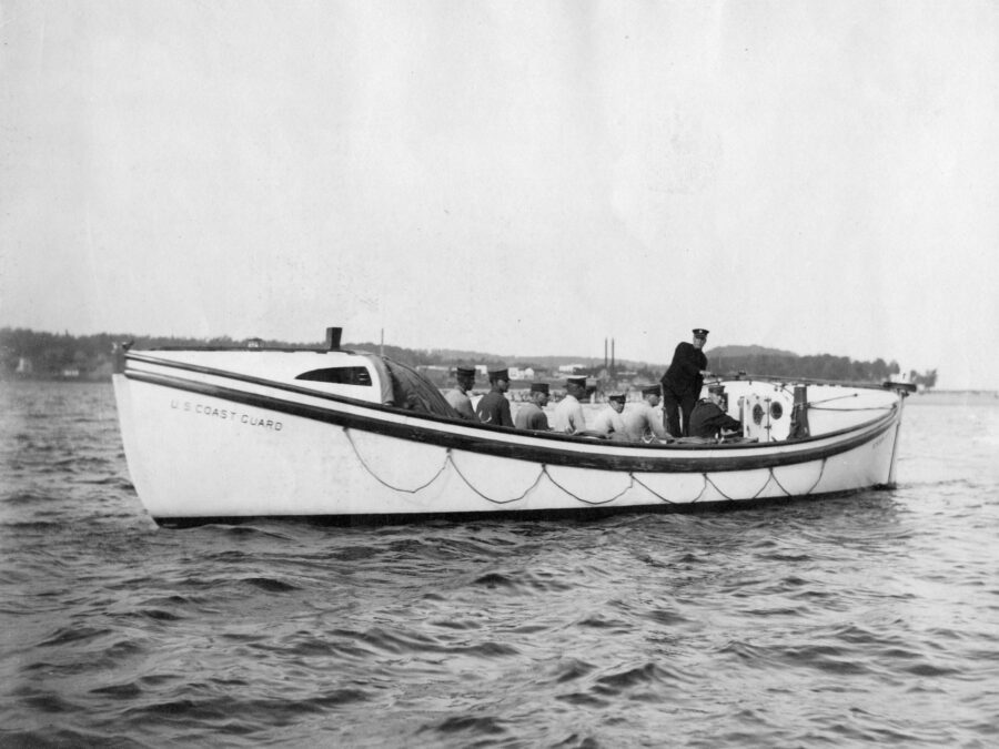 Photo: Port view of a Type “E” motor surfboat with crew.