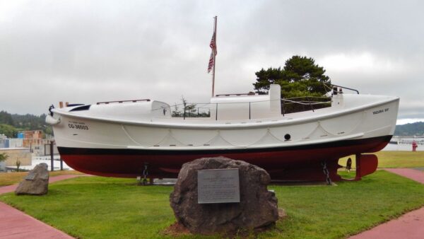 Photo: The lifesaving marker and 36-foot motor lifeboat on display at Coast Guard Station Yaquina Bay, Newport, Oregon
