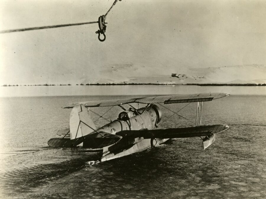 Photo: A Grumman Duck amphibious plane speed forward throughy icy waters.