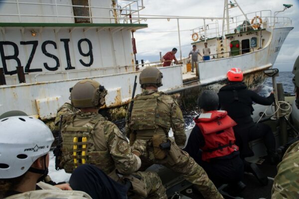 Photo: LEDET team members board a vessel.