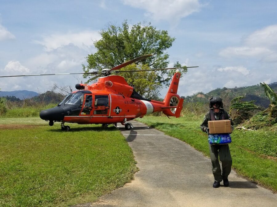 Photo: Supplies being delivered by helicopter.