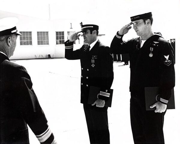 Photo: LCDR Paul Lewis Paul Lewis and ASM3 Larry Farmer being awarded respective medals.