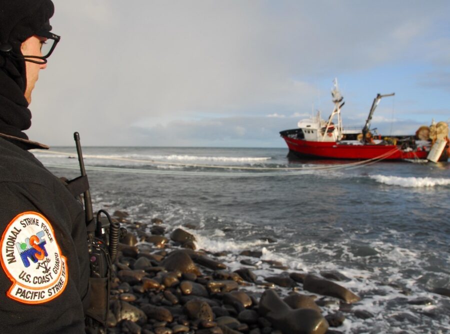 Photo: Pacific Strike Team member, Chief Petty Officer Alan Dooley, observes fuel-lightering operations on a grounded fishing vessel on St. George Island, Alaska.