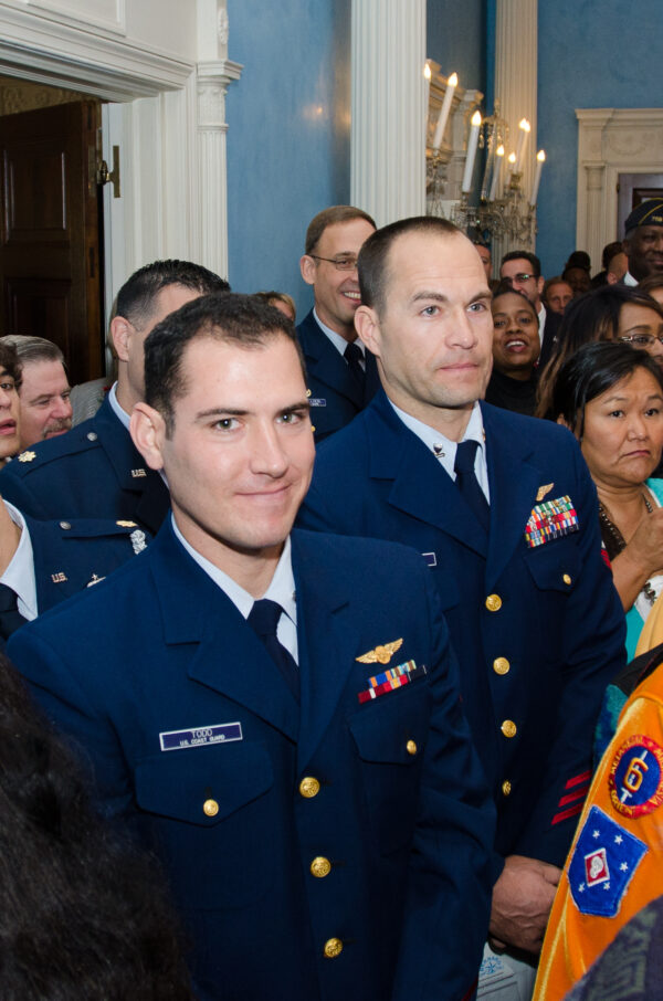 Photo: Daniel Tood and Randy Haba and others at an awards ceremony.