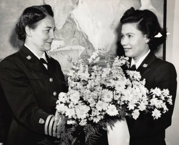 Photo: Capt. Dorothy Stratton, left, is greeted by distinguished enlisted SPAR Florence Finch during Stratton’s visit to Hawaii during World War II.
