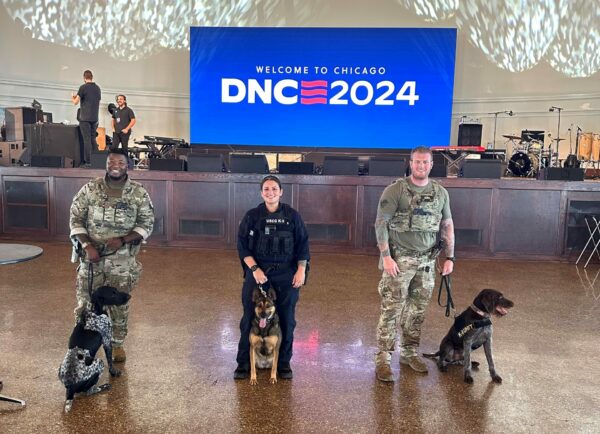 Photo: CEDT team members posing in front of “DNC 2024” sign.