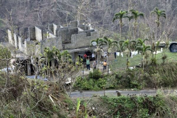 Aerial photo: Locals waiving for help in the central highlands of Puerto Rico.