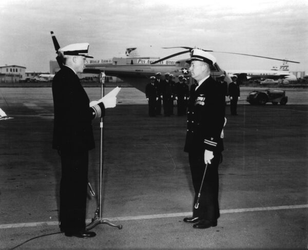 Photo: RADM Russell Wood (left) presents Distinguished Flying Cross to LT Henry Pfeiffer.