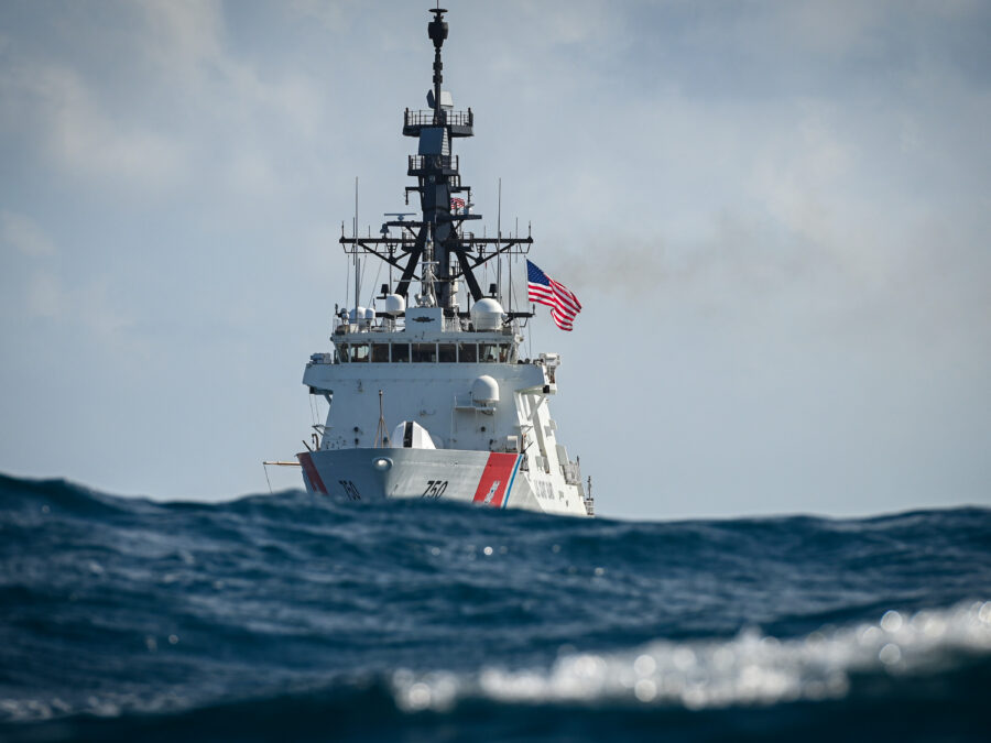 Photo: U.S. Coast Guard Cutter Bertholf with waves in foreground.