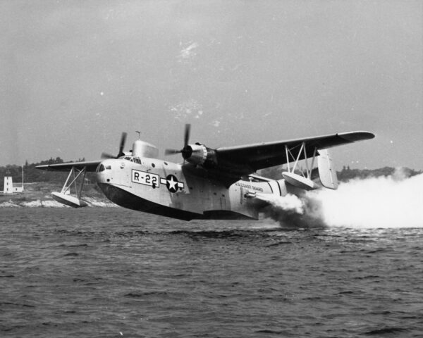 B/W Photo: A PBM-5 sea plan takes off from the water with jet assist.
