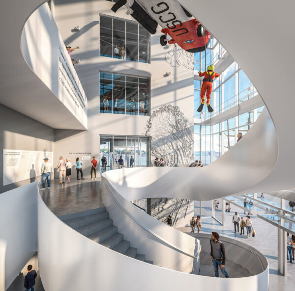 Concept art rendering of the future atrium at the National Coast Guard Museum. This displays visitors on a spiral staircase, at the overlook from deck two through four, at the museum entrance, with the main windows in the background.